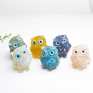 Six colorful resin owl statues with natural crystal chips and golden flakes detail