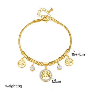 Golden snake chain bracelet with tree of life hollow pendant and sparkling rhinestones