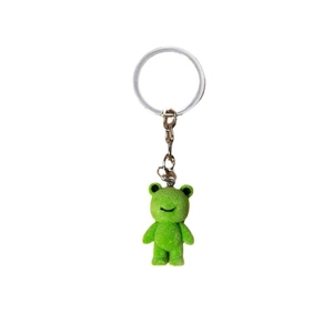 Cute green flocked 3D frog keychain pendant with metal ring and chain on white background