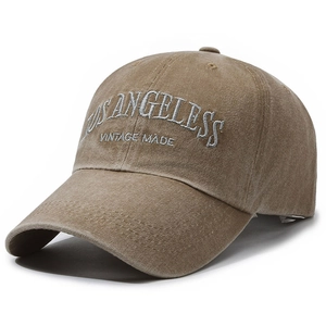 Brown washed cotton baseball cap with Los Angeles vintage embroidery in a 45-degree side view