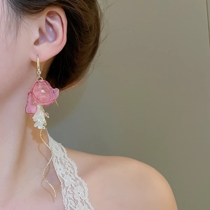Pink tulle flower earrings with white lily of the valley beads and gold tassels