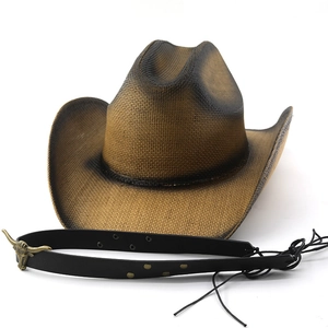 Chapeau de cowboy vintage en paille tressée avec ruban en cuir et boucle tête de taureau
