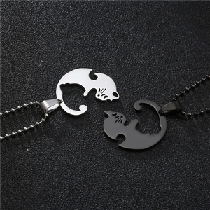 Titanium steel couple necklaces featuring black and white jigsaw cat pendants with bead chains