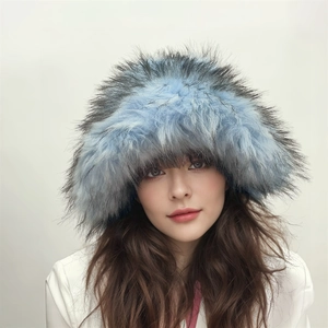 Detailed close-up of light blue faux fur hat showing fluffy texture and thick winter material