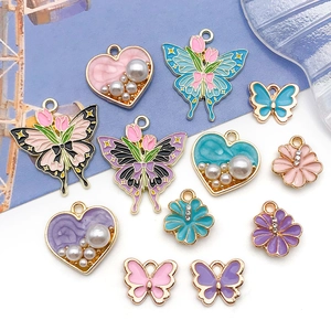 Set of 12 DIY butterfly heart and flower charms with enamel finish and faux pearls