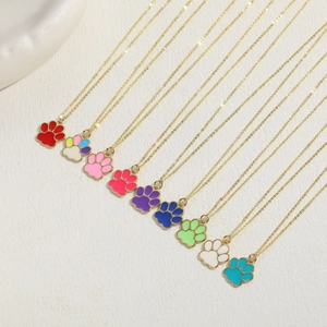Golden chain necklaces with colorful cat paw pendants in multiple vibrant enamel colors