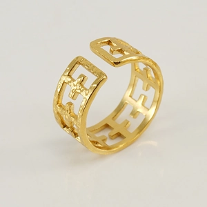 Gold plated stainless steel open ring featuring a hammered texture and cross cutout design