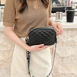Quilted black crossbody mini bag with LOVE slogan canvas strap and gold hardware