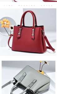Detail view of red and grey soft leather handbags with elegant silver chain decoration