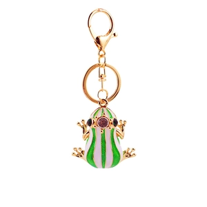 Cute green crystal frog metal keychain with colorful rhinestones on a white background