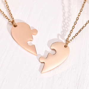 Detail view of gold heart puzzle friendship necklace set for best friends and family