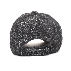 Close-up of winter thick knit baseball cap back showing grey marl texture and strap