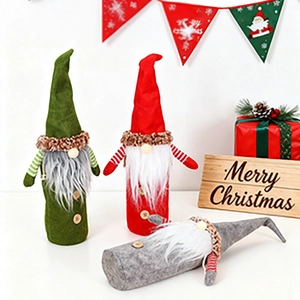 Three Christmas gnome wine bottle covers in red, green and grey with long white beards