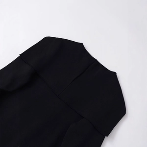 Minimalist black knitted short cardigan with a double-collar design and soft texture