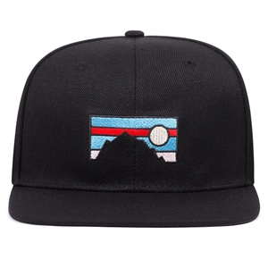 Front view of black cotton baseball cap with mountain embroidery patch in outdoor style