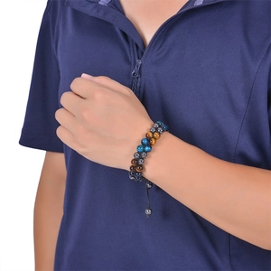Double-layer braided tiger eye and magnetic stone bracelet with tree of life on wrist