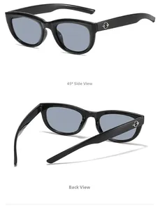Detail view of vintage cat-eye sunglasses with silver logo and light blue lenses