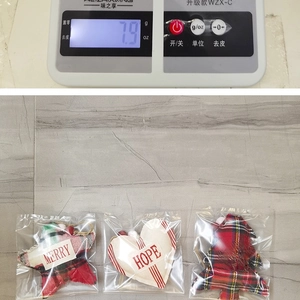 Three-piece Christmas fabric ornaments featuring Merry, Hope, and Joy festive lettering