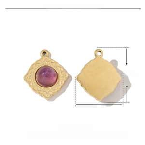 Detailed view of purple natural stone pendant with gold embossed stainless steel frame