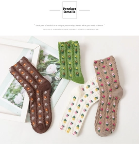 Detailed knit texture and floral embroidery on vintage style crew socks for women