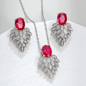 Luxurious red gemstone jewelry set with silver necklace and earrings for brides