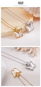 Macro detail of butterfly pendant with white shell inlay and 18K gold plated steel chain