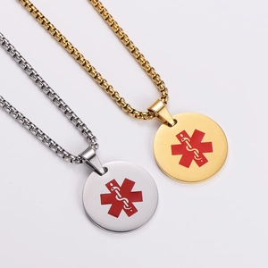 Polished medical alert pendant necklace with red caduceus symbol in gold and silver