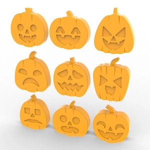 Detail of orange silicone pumpkin molds with varied expressions for Halloween treats
