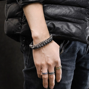 Men's skull bracelet with volcanic stone beads and silver Cuban chain plus vintage rings