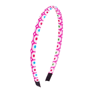 Pink fabric headband for girls with colorful floral dot patterns on a white background