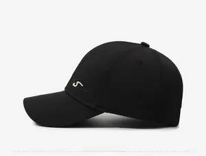 Side view of black cotton baseball cap with white Sport embroidery and curved brim