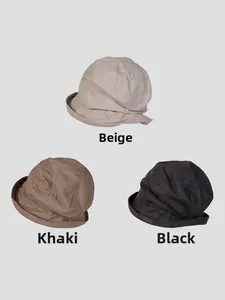 Linen bucket hats displayed in beige, khaki, and black colors with natural texture