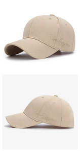 Dettaglio cappello baseball kaki con ricamo Hello Gorgeous e tessuto strutturato