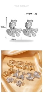 Macro view showing dimensions of ginkgo leaf stainless steel earrings with weight detail
