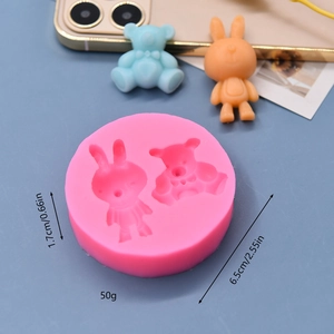 Pink silicone mold featuring cute cartoon bear and rabbit shapes for resin and cake crafts