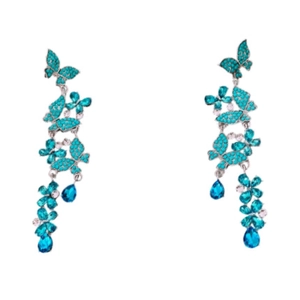 Elegant sparkling blue butterfly tassel drop earrings with crystals on white background