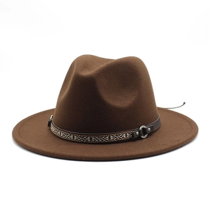 Close-up of ethnic patterned band and silver buckle on dark brown cashmere felt hat