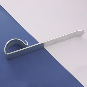 Close-up of polished stainless steel metal bending tool for DIY jewelry making and crafts
