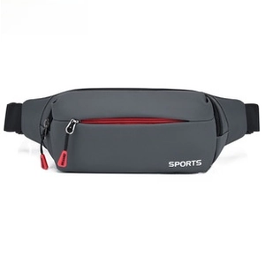 Close-up of waterproof oxford fabric and red zipper pocket on gray sports chest bag