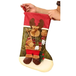 Linen Christmas stocking with 3D reindeer doll holding skis, festive gift bag decoration