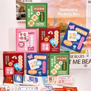 Colorful stationery blind box set including spiral notebooks with cute illustrations