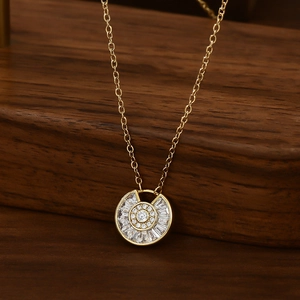 Exquisite gold-plated collar necklace with a sparkling sunburst zircon pendant on wood