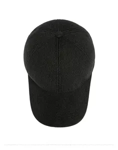 Top view of black waffle knit winter baseball cap with thick thermal lining
