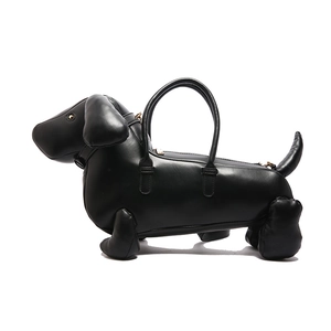 Creative black dachshund dog shaped tote bag with gold zipper and dual handles