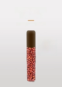 Macro view of food container with clear visual window showing grain storage capacity