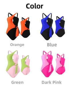 Detail view of one-piece swimsuits with asymmetrical shoulder straps and metal ring buckles