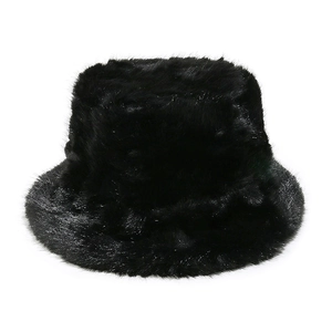 Detail shot of the thick black faux fur bucket hat, highlighting its plush texture
