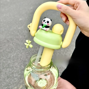 Detail showing the portable handle and cute panda lid on this large plastic water bottle