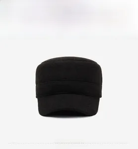 Detailed view of thick fleece-lined earflaps on a dark winter military cap for men