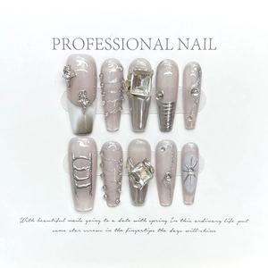 Handmade long coffin press-on nails with purple glitter, silver stars and rhinestones
